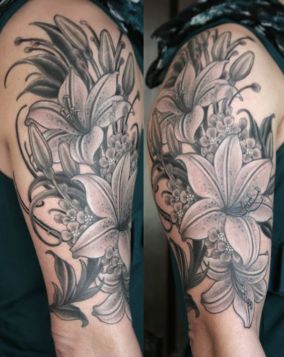 Black And Grey Lily Flowers Tattoo On Sleeve