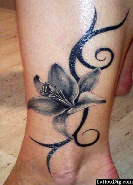 Black And Grey Lily Tattoo On Ankle