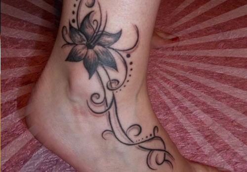 Black And Grey Lily Tattoo On Girl Right Ankle