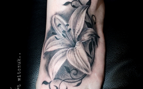 Black And Grey Lily Tattoo On Left Foot