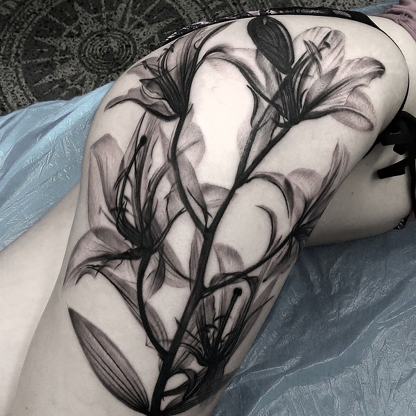 Black And Grey Lily Tattoo On Leg Sleeve