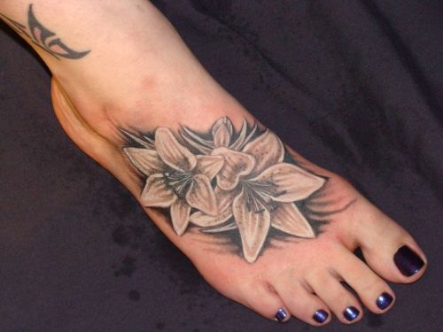 Black And Grey Lily Tattoo On Right Foot For Girls