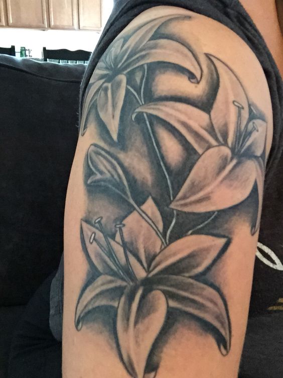 Black And Grey Lily Tattoo On Right Half Sleeve