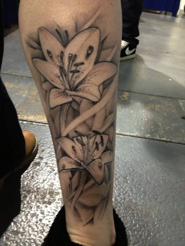 Black And Grey Lily Tattoo On Right Leg