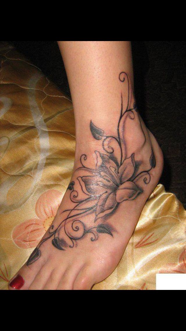 Black And Grey Lotus Flower Tattoo On Girl Left Foot