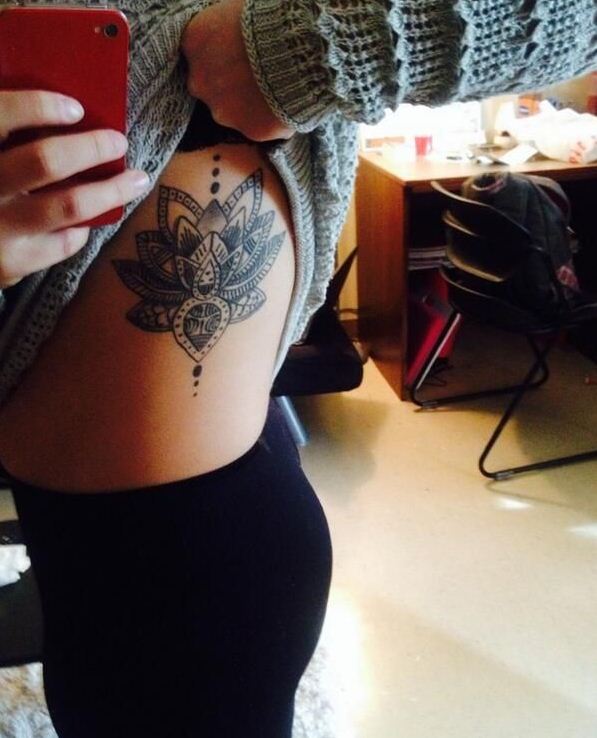 Black And Grey Lotus Flower Tattoo On Girl Left Side Rib