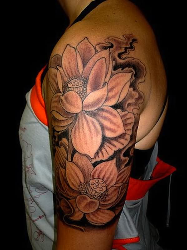 Black And Grey Lotus Flowers Tattoo On Women Left Half Sleeve