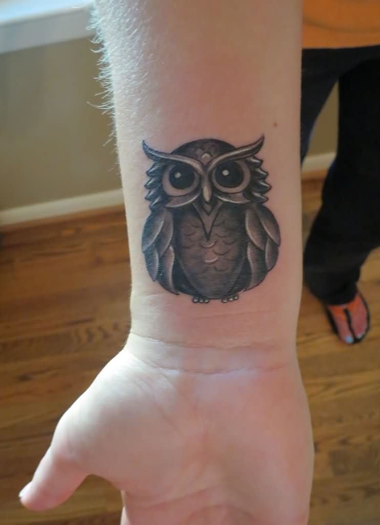 Black And Grey Owl Tattoo On Right Wrist
