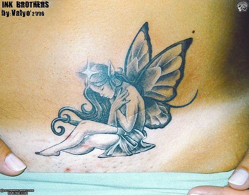 Black And Grey Realistic Fairy Tattoo Design For Lower Back