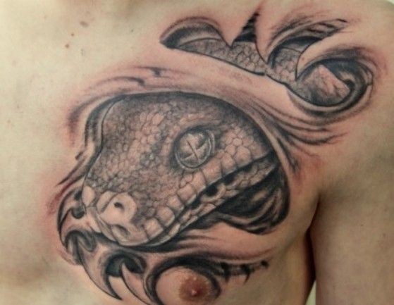 Black And Grey Realistic Ripped Skin Snake Head Tattoo On Man Left Chest