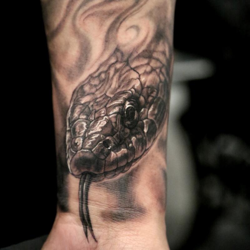 Black And Grey Realistic Snake Tattoo On Wrist