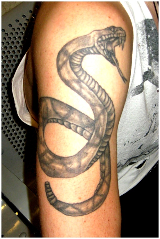 Black And Grey Snake Tattoo On Man Right Half Sleeve