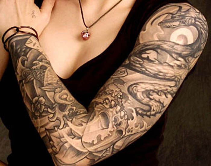Black And Grey Snake With Flowers Tattoo On Women Left Full Sleeve