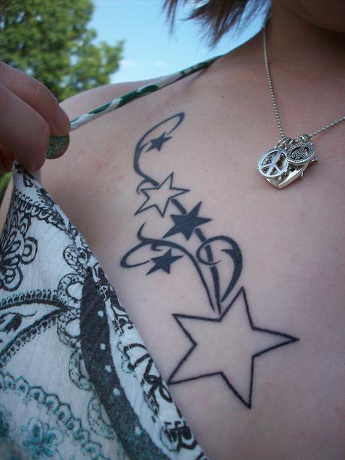 Black And Outline Star Tattoos On Girl Front Shoulder