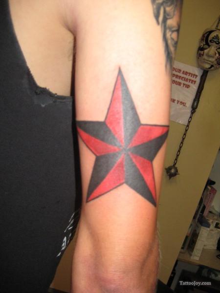 Black And Red Nautical Star Tattoo On Left Bicep