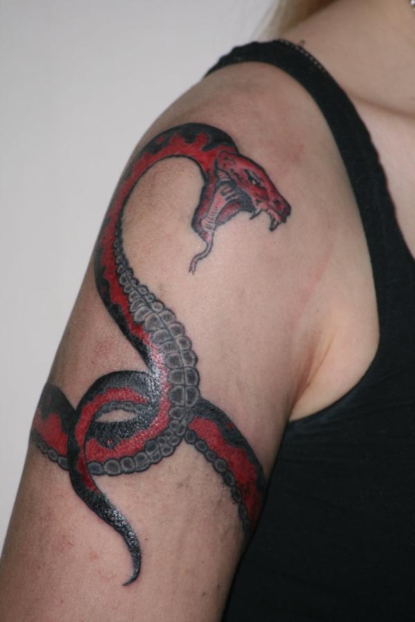 Black And Red Snake Tattoo On Women Right Upper Arm