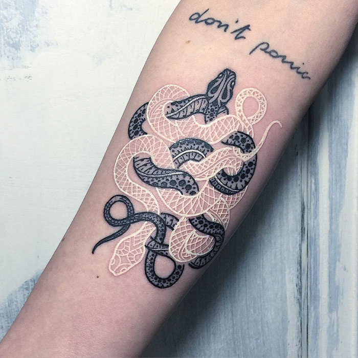 Black And White Two Snake Tattoo On Right Forearm