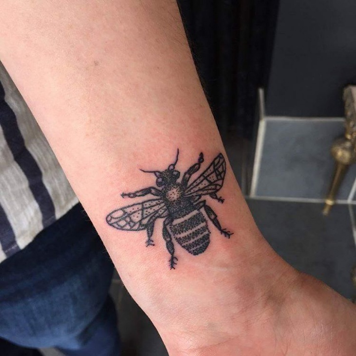 Black Dotwork Bumblebee Tattoo Design For Wrist