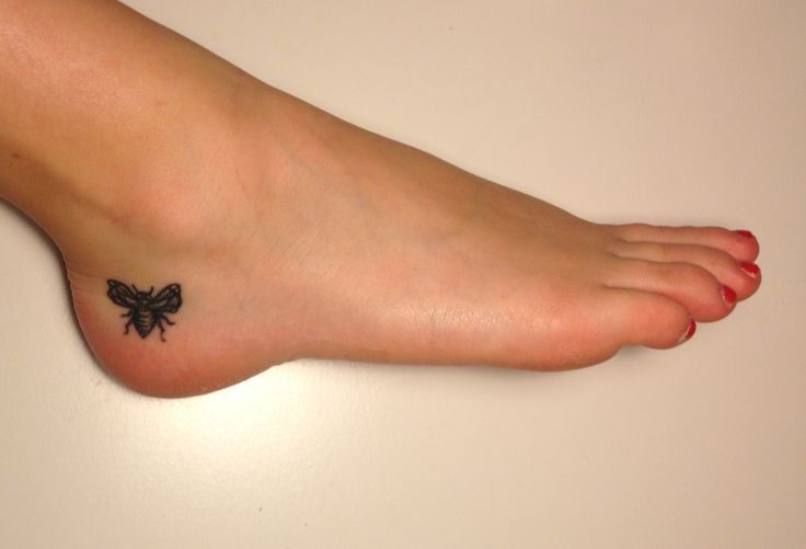 Black Ink Bumblebee Tattoo On Right Ankle