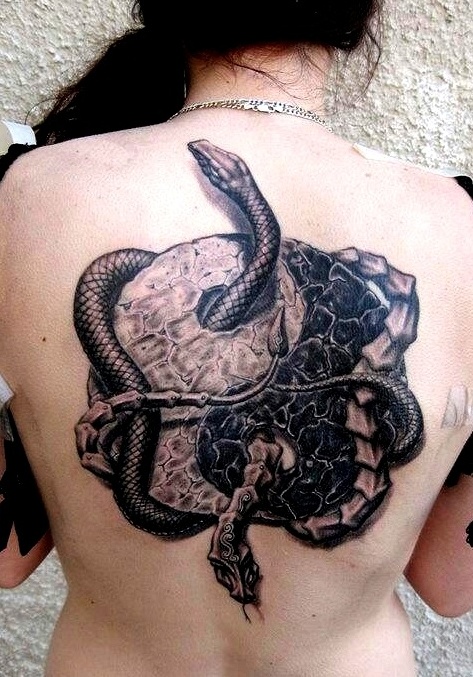 Black Ink Chinese Snake With Yin Yang Tattoo On Girl Upper Back