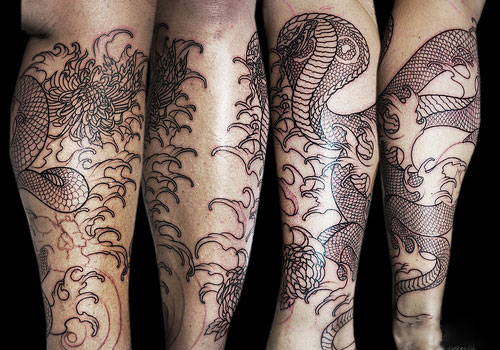 Black Ink Cobra Snake Tattoo Design For Arm