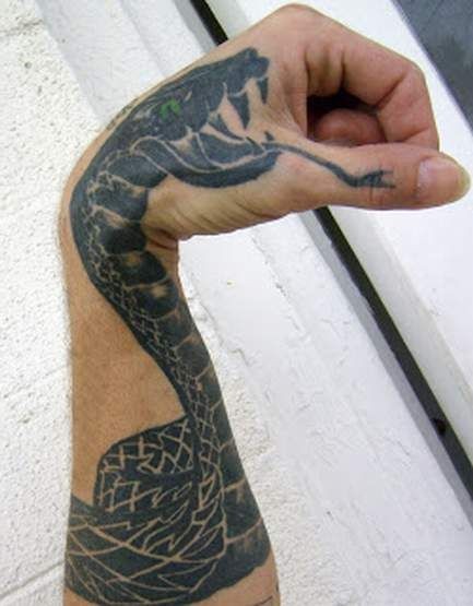 Black Ink Cobra Snake Tattoo On Left Arm