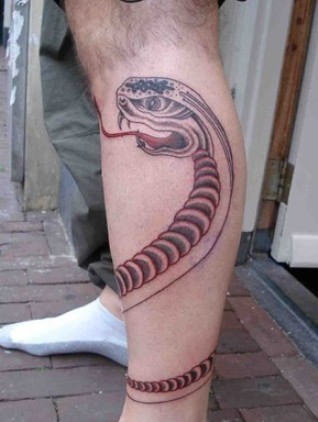 Black Ink Cobra Snake Tattoo On Left Leg