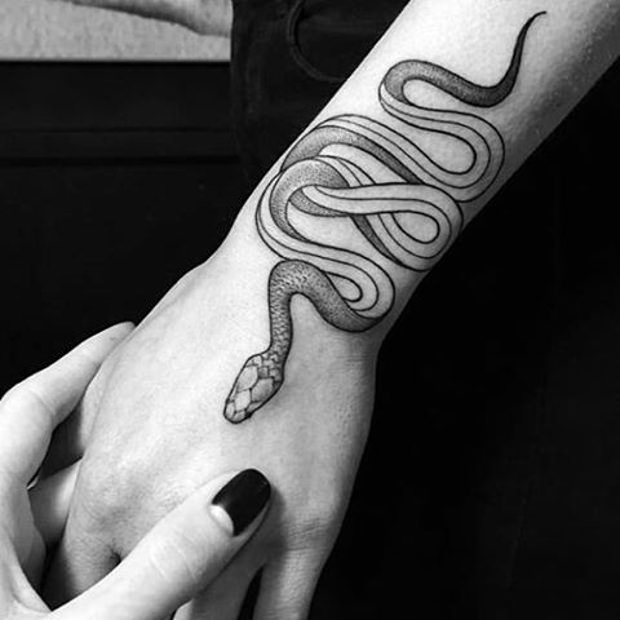 Black Ink Dotwork Snake Tattoo On Right Upper Wrist