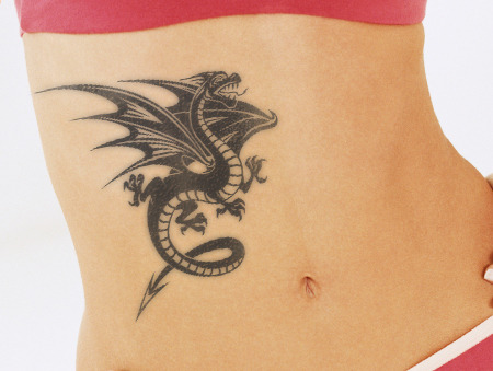 Black Ink Dragon Tattoo On Girl Right Hip