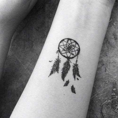 Black Ink Dreamcatcher Tattoo On Left Forearm