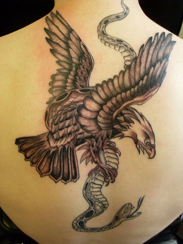 Black Ink Eagle With Snake Tattoo On Upper Back