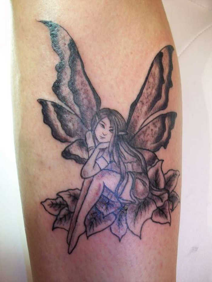 Black Ink Fairy On Leaves Tattoo Design For Leg