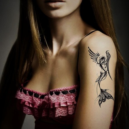 Black Ink Fairy Tattoo On Girl Left Upper Arm