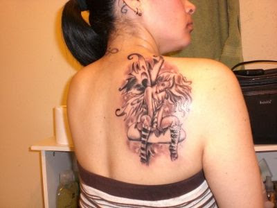 Black Ink Fairy Tattoo On Women Right Back Shoulder