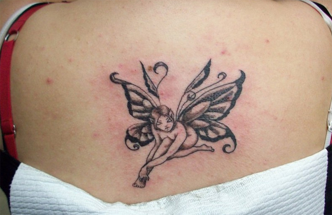 Black Ink Fairy Tattoo On Women Upper Back