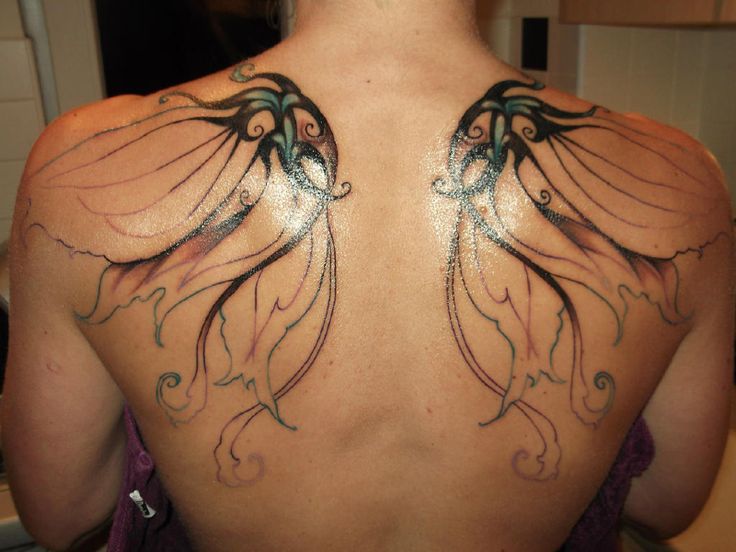 Black Ink Fairy Wings Tattoo On Upper Back