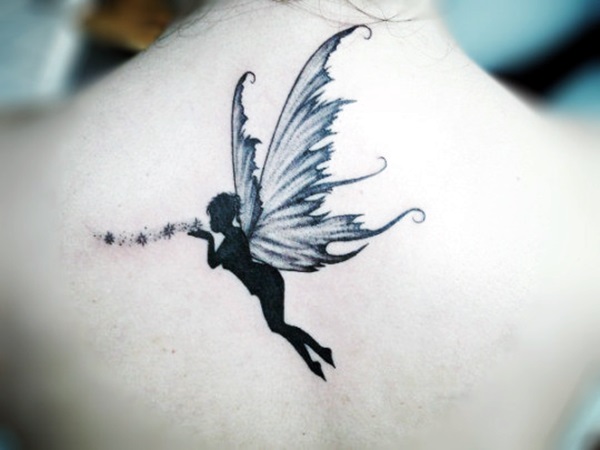 Black Ink Fairy With Fairy Dust Tattoo On Upper Back