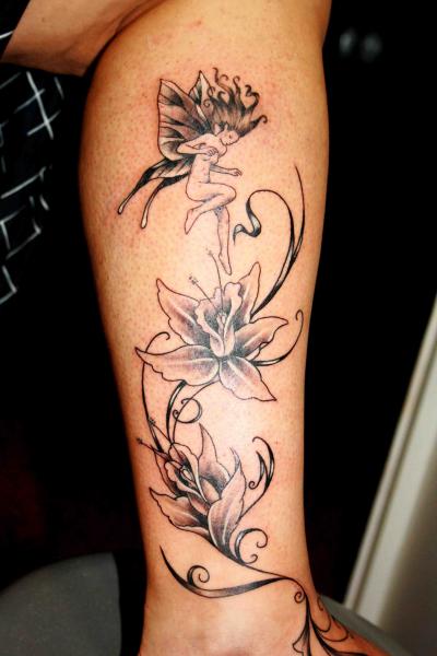 Black Ink Fairy With Flowers Tattoo On Right Leg