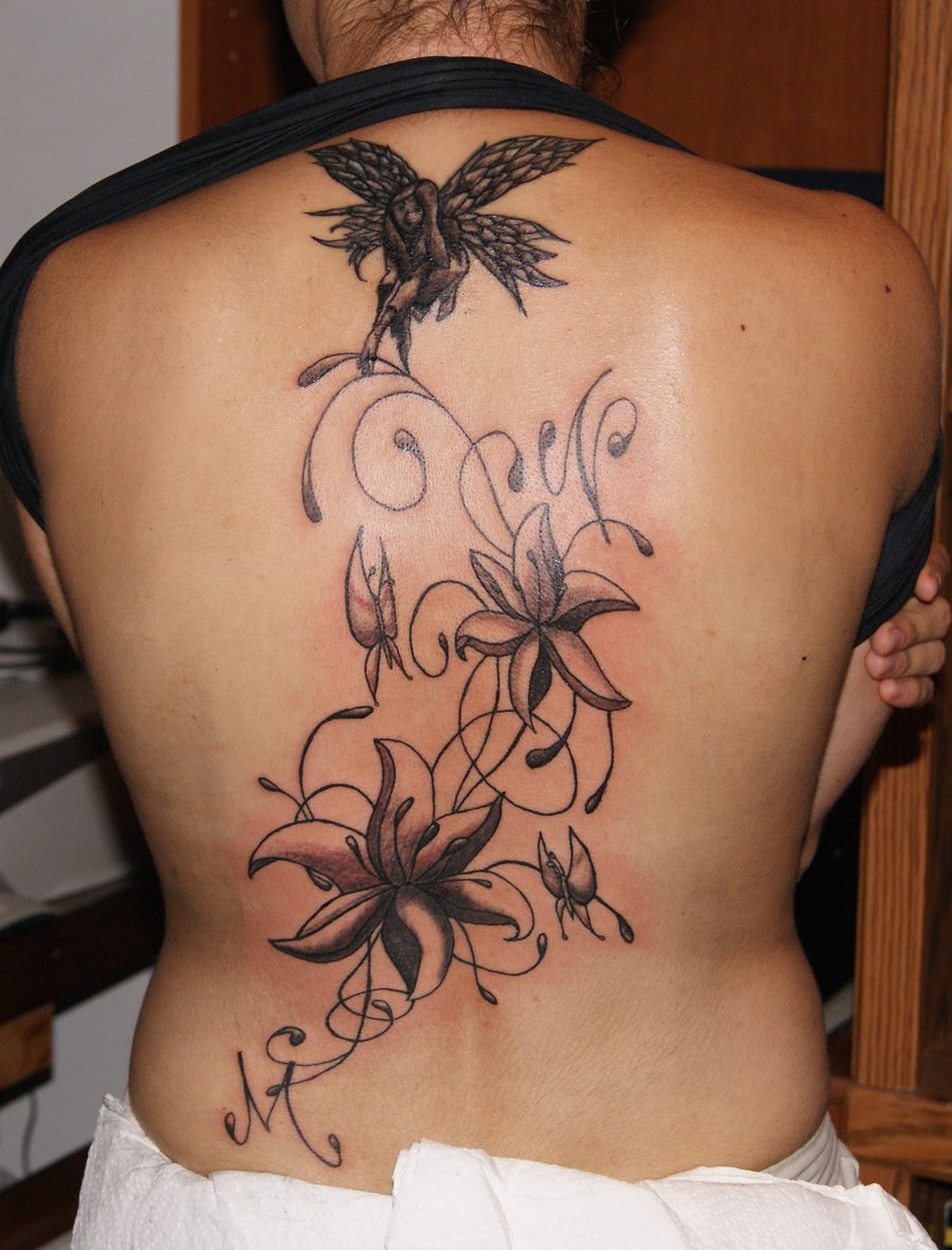 Black Ink Fairy With Flowers Tattoo On Women Full Back