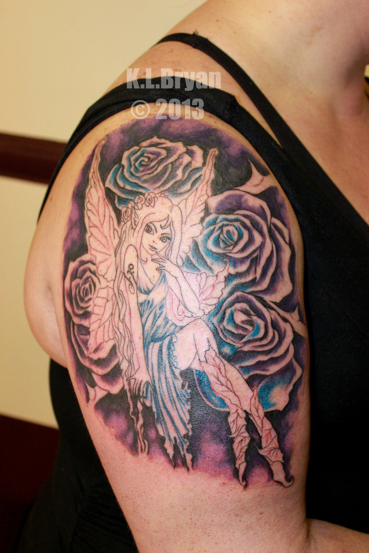 Black Ink Fairy With Roses Tattoo On Women Right Upper Arm