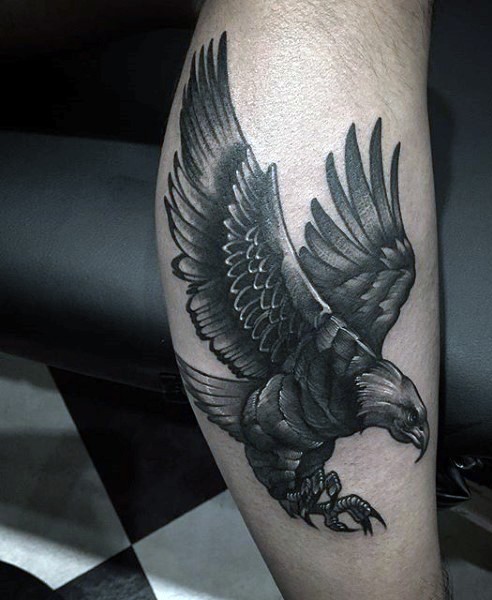 Black Ink Flying Eagle Tattoo On Leg Calf