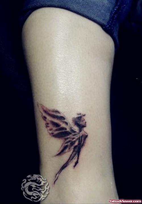 Black Ink Flying Fairy Tattoo Design For Leg