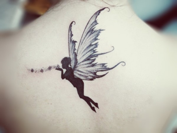 Black Ink Flying Fairy With Stars Tattoo On Upper Back