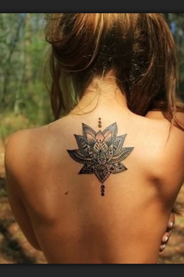 Black Ink Henna Lotus Tattoo On Girl Upper Back