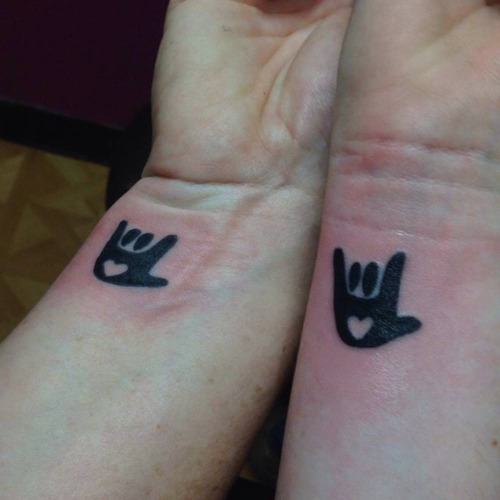 Black Ink I Love You Sign Tattoos On Wrist For Couple