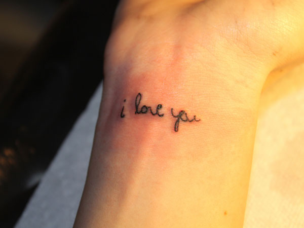 Black Ink I Love You Tattoo On Wrist