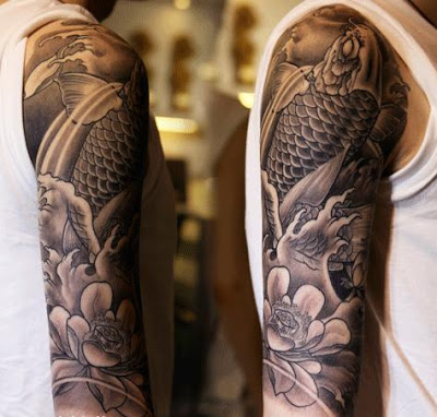 Black Ink Koi Fish With Lotus Flowers Tattoo On Man Right Upper Arm