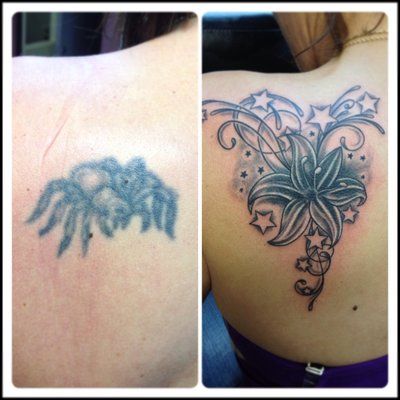 Black Ink Lily Cover Up Tattoo On Girl Left Back Shoulder