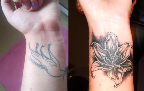 Black Ink Lily Cover Up Tattoo On Wrist