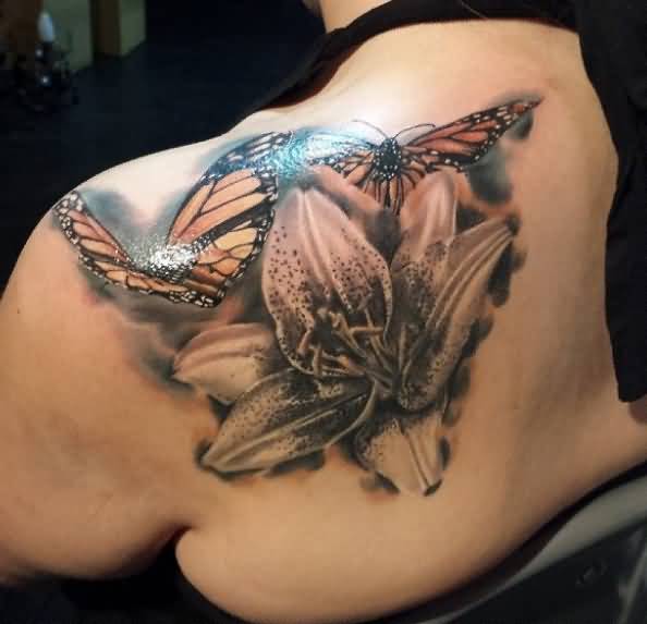 Black Ink Lily Flower With Butterflies Tattoo On Left Back Shoulder
